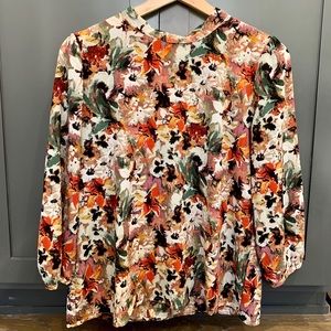 Floral blouse with tie bow detail